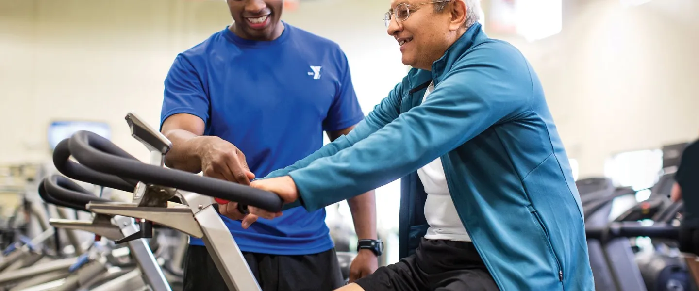 active older adult exercising on a cycle