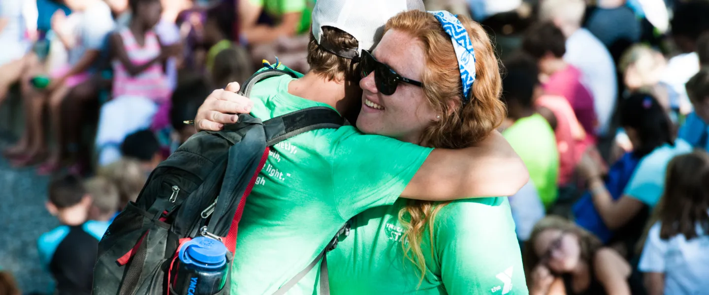 Camp Hanes counselors hugging