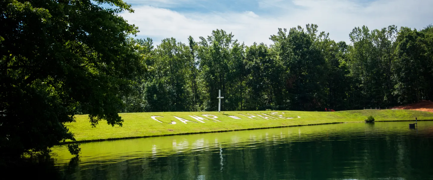 Camp Hanes lake and cross