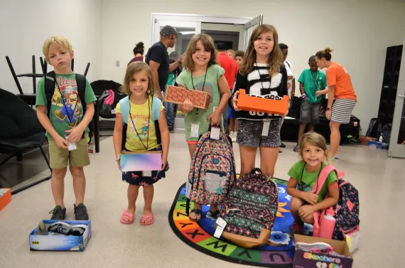 Kids with new shoes and backpacks