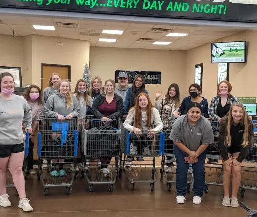 Teenagers with shopping carts