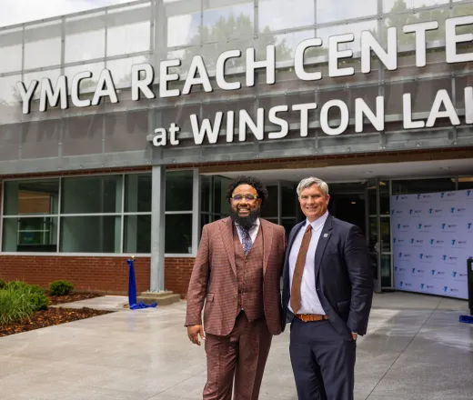 kenneth pettigrew and darryl head infront of newly opened YMCA REACH Center at Winston Lake