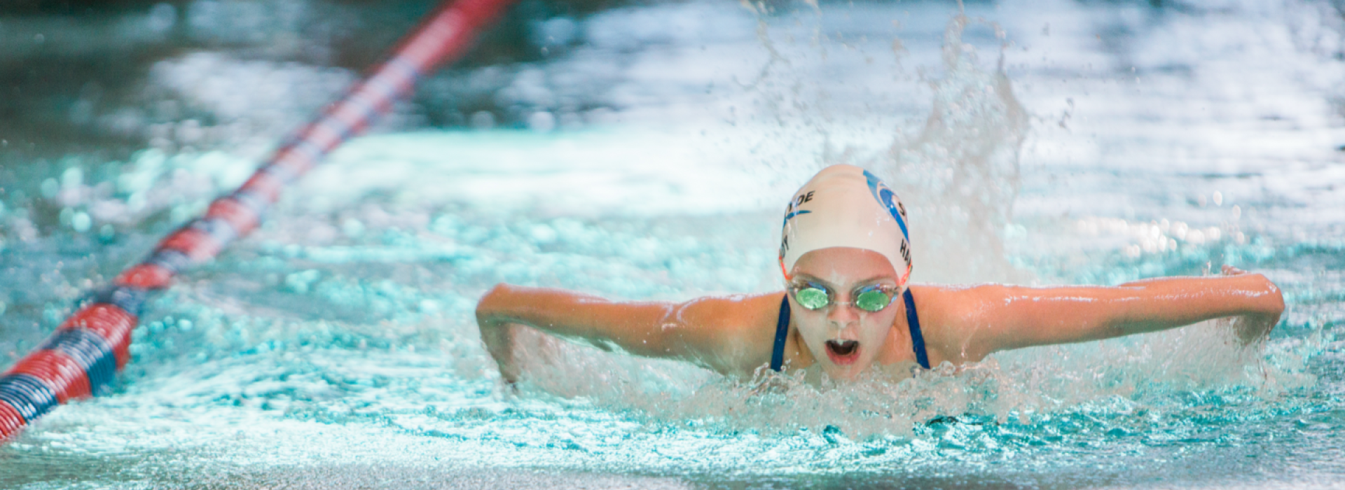 Person swimming butterly