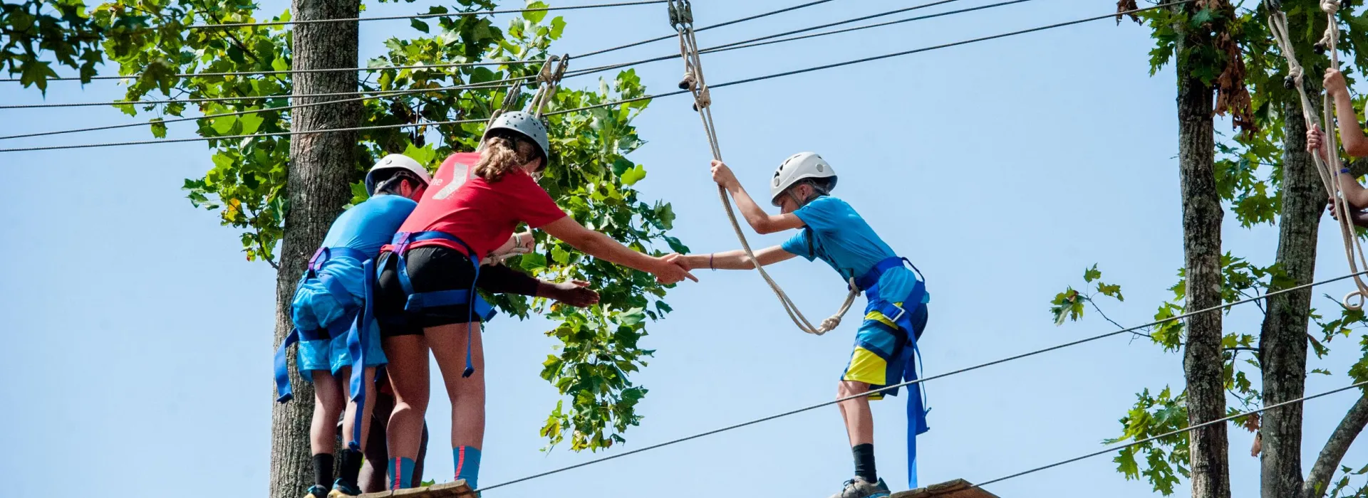 Kids on high ropes at Camp Hanes